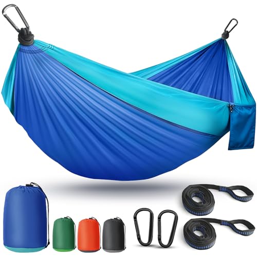 PUPTILY blue camping hammock hanging between two trees